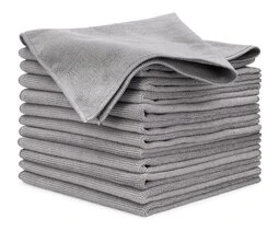 A stack of neatly folded gray microfiber cloths for auto detailing.