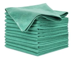 A stack of neatly folded teal microfiber cloths for auto detailing, isolated on a white background.